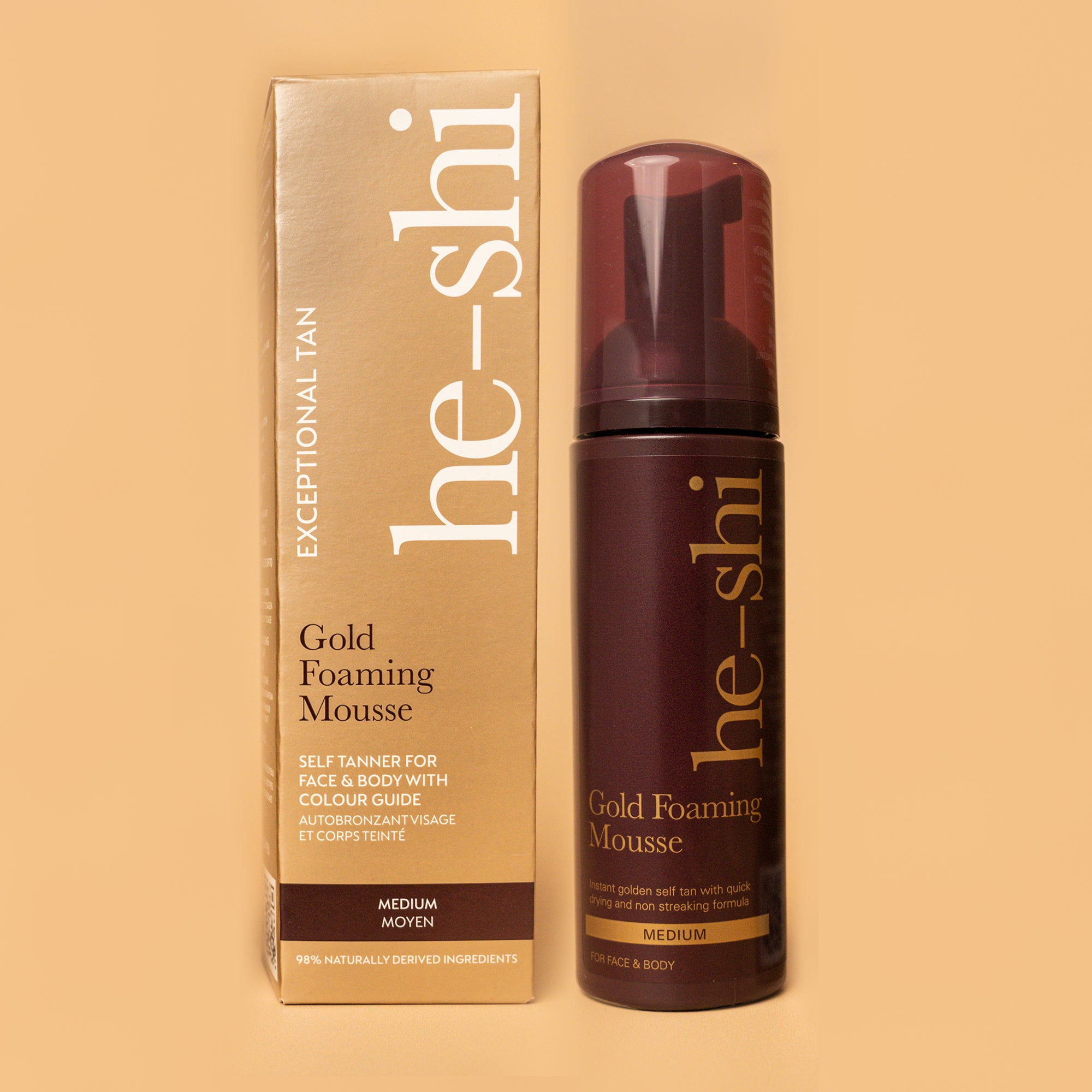 He-Shi Gold Foaming Mousse bottle with medium self-tan formula, showcasing easy application and quick-dry feature.