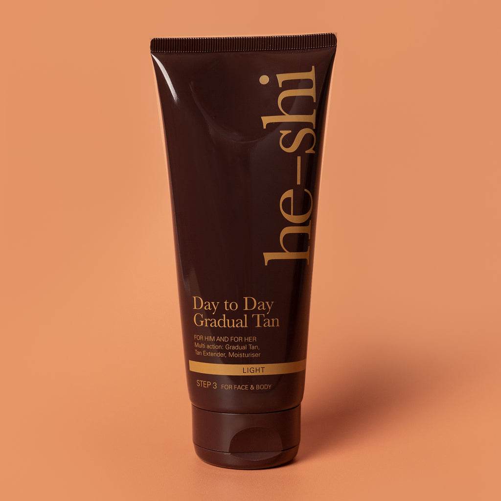 He-Shi Day to Day Gradual Tan 200ml bottle with creamy texture, promoting a nourishing self-tan glow.
