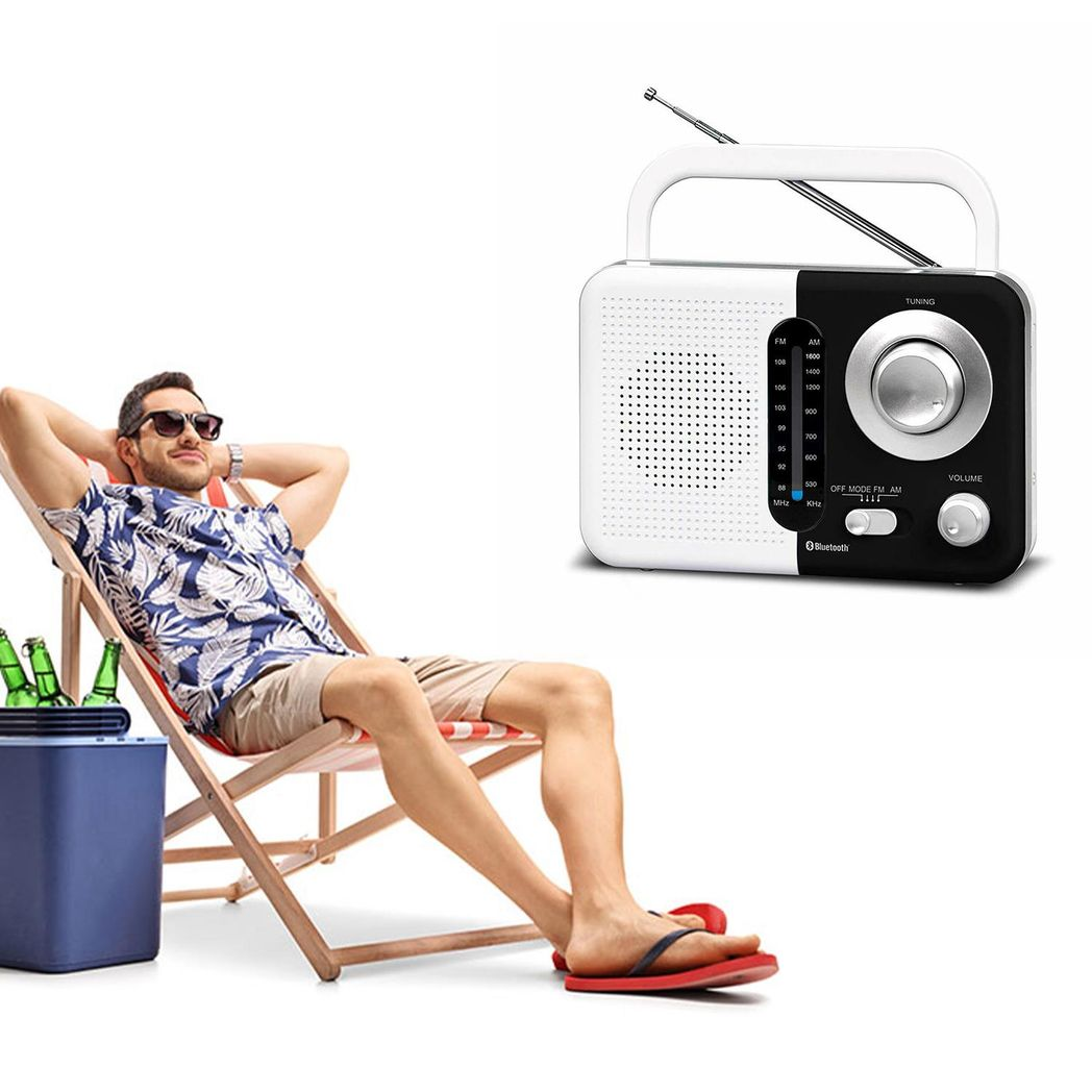 Black and white Soundz AM/FM Bluetooth radio with USB port and SD card slot, featuring a sleek design and clear display.