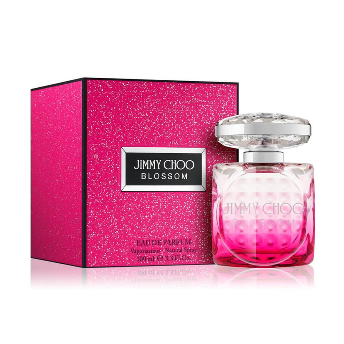 Jimmy Choo Blossom Eau de Parfum Spray 100ml in a pink bottle with floral accents, showcasing a luxurious fragrance.