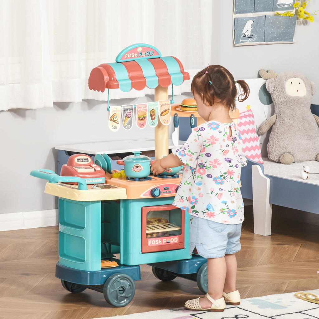 Colorful HOMCOM kids kitchen play set with trolley cart and various pretend food items for ages 3-6.