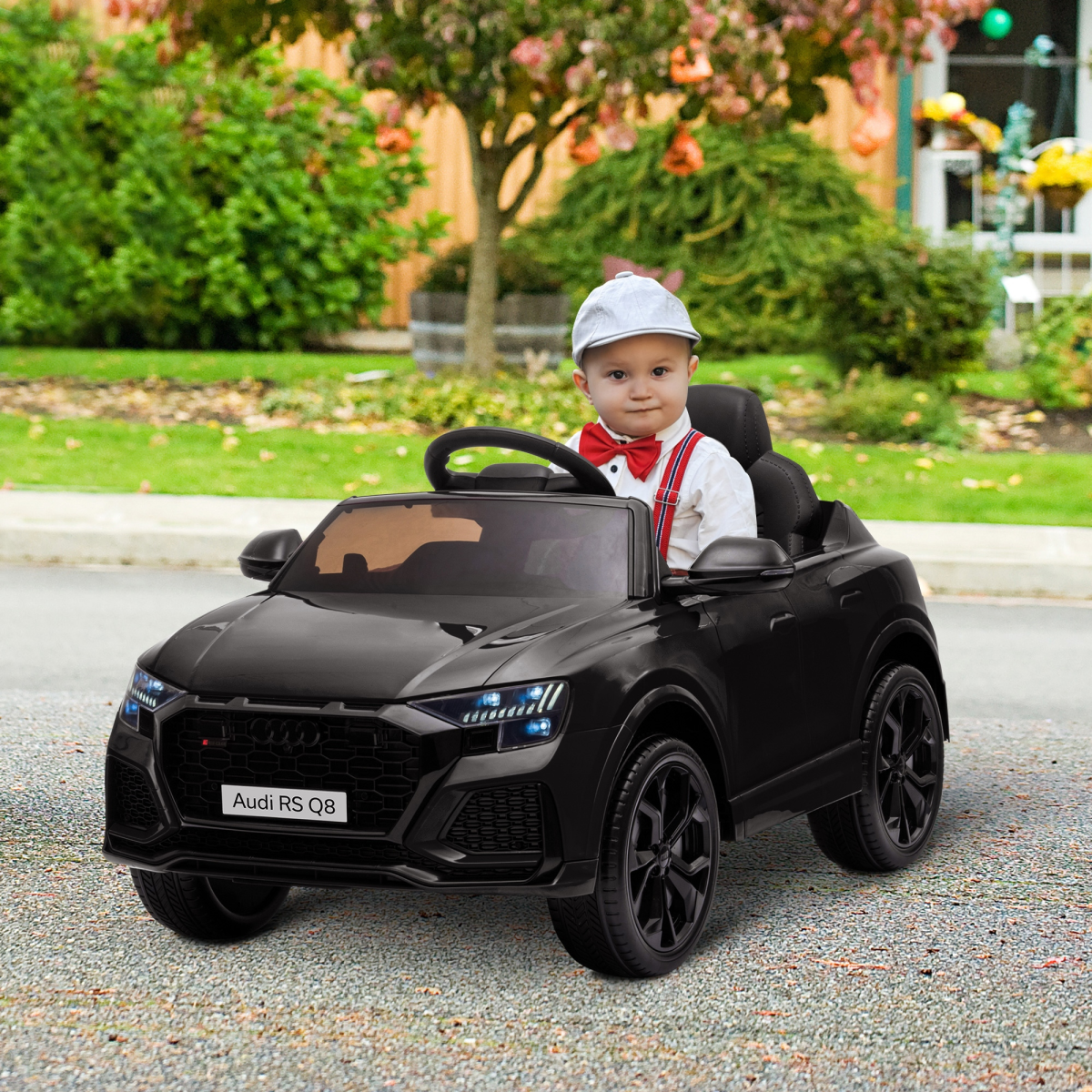 Black Audi RS Q8 kids electric ride-on car toy with remote, USB, MP3, and Bluetooth features from FunZone.