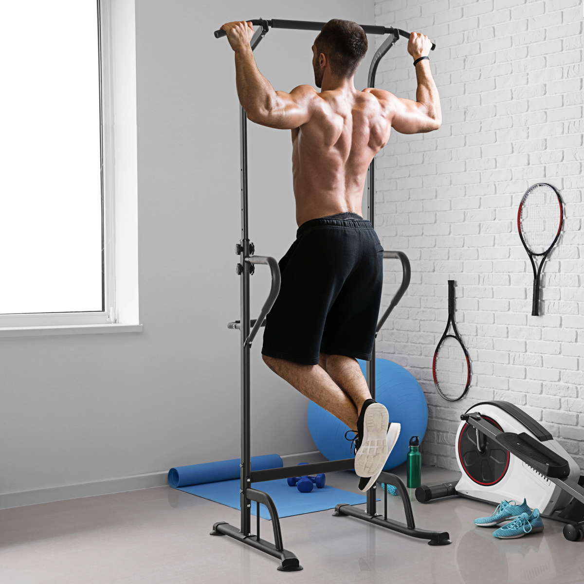 HOMCOM Power Tower Dip Station with pull-up bar and push-up equipment for home gym workouts.