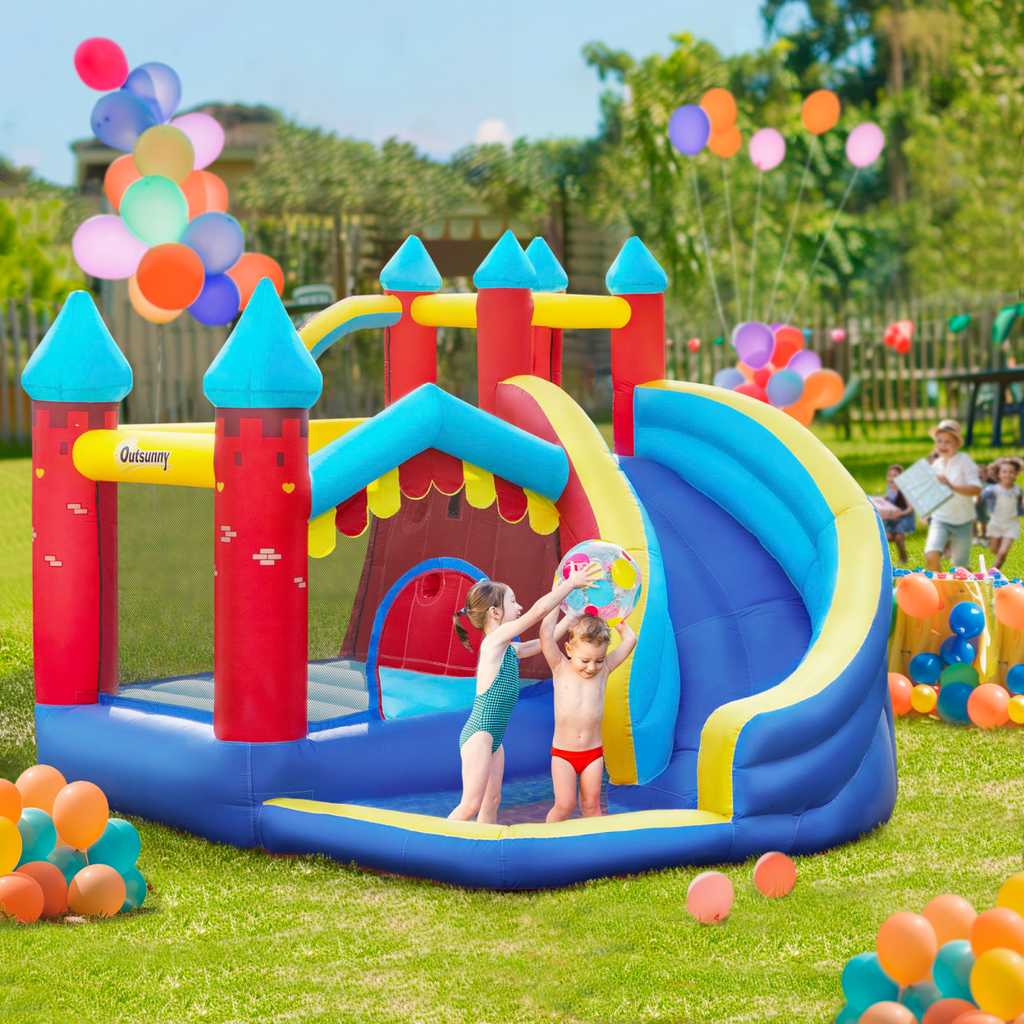 Kids bouncy castle with slide, pool, and climbing wall, featuring vibrant colors and inflatable design by FunZone.