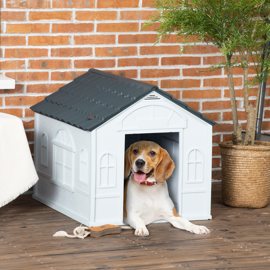 PawHut grey weather-resistant dog house designed for medium dogs, featuring a sturdy shelter and cozy interior.