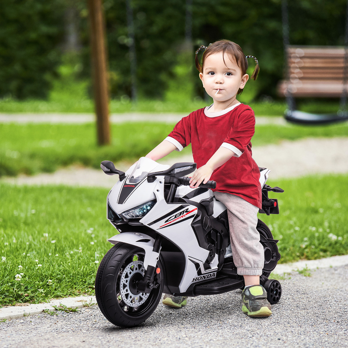 Licensed Honda 6V electric motorbike for kids with training wheels, designed for ages 3-5, in vibrant colors.