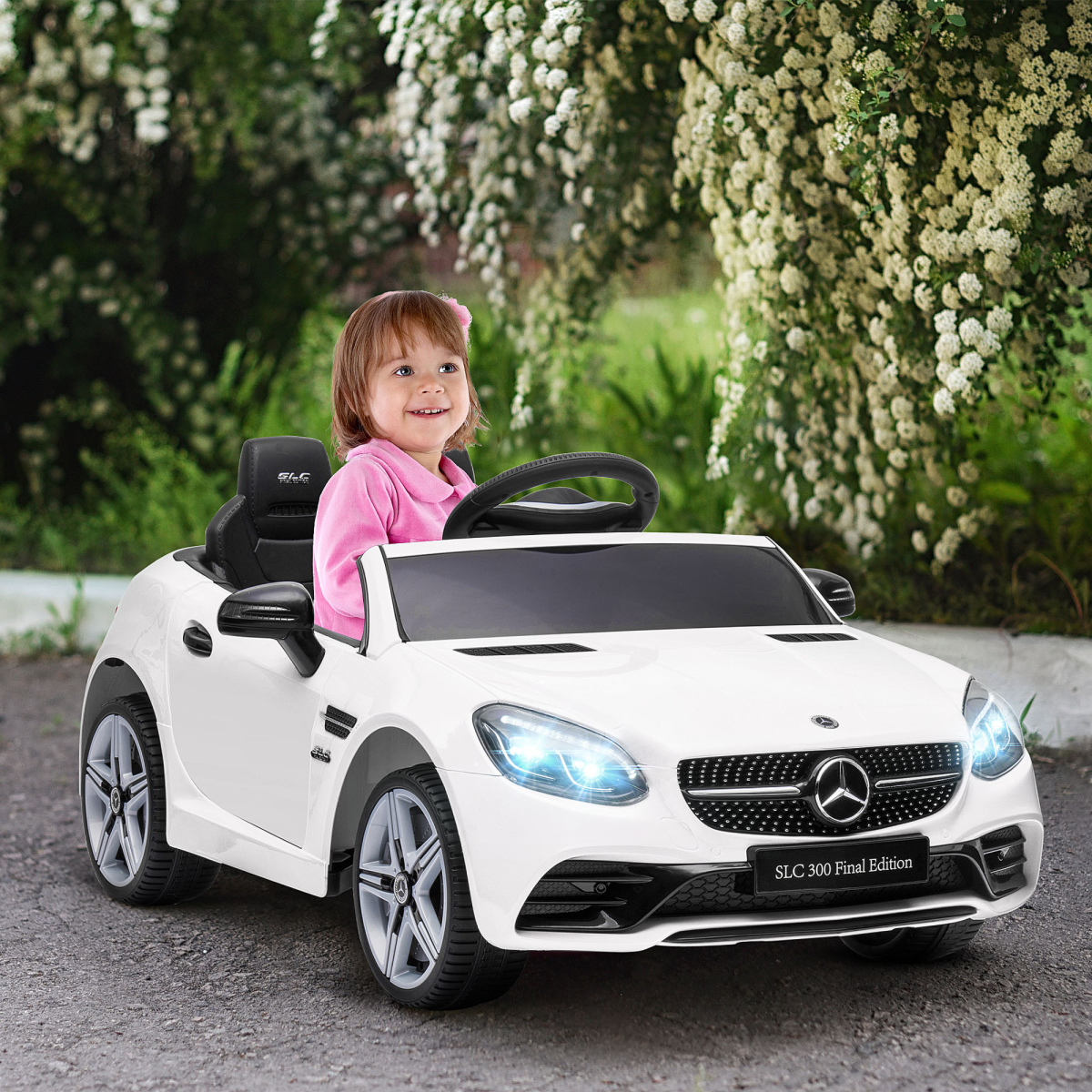 HOMCOM Benz 12V kids electric ride-on car in white with remote control and music features, parked on a driveway.