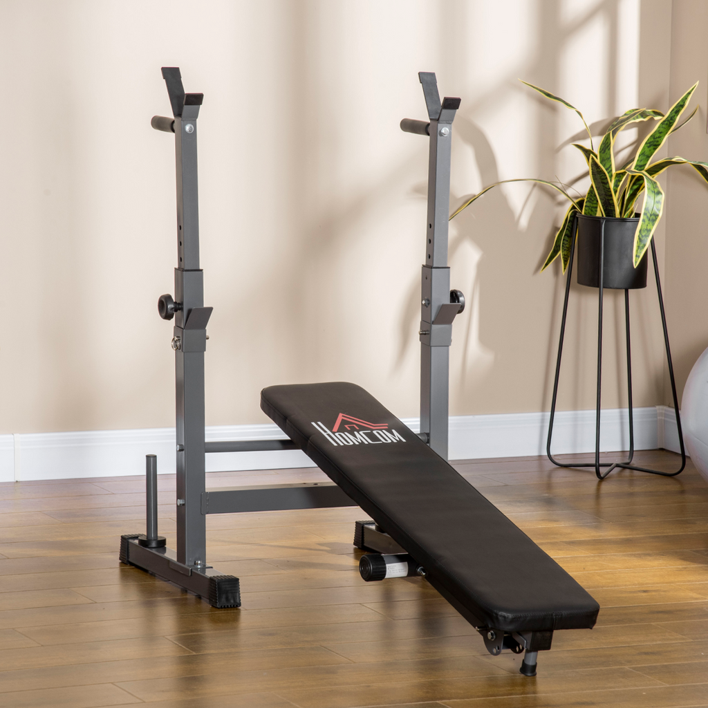Adjustable foldable weight bench with barbell rack and dip station from ActiveGear, designed for versatile workouts.