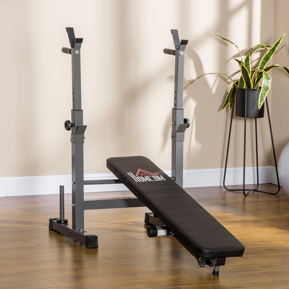 Adjustable foldable weight bench with barbell rack and dip station from ActiveGear, designed for versatile workouts.