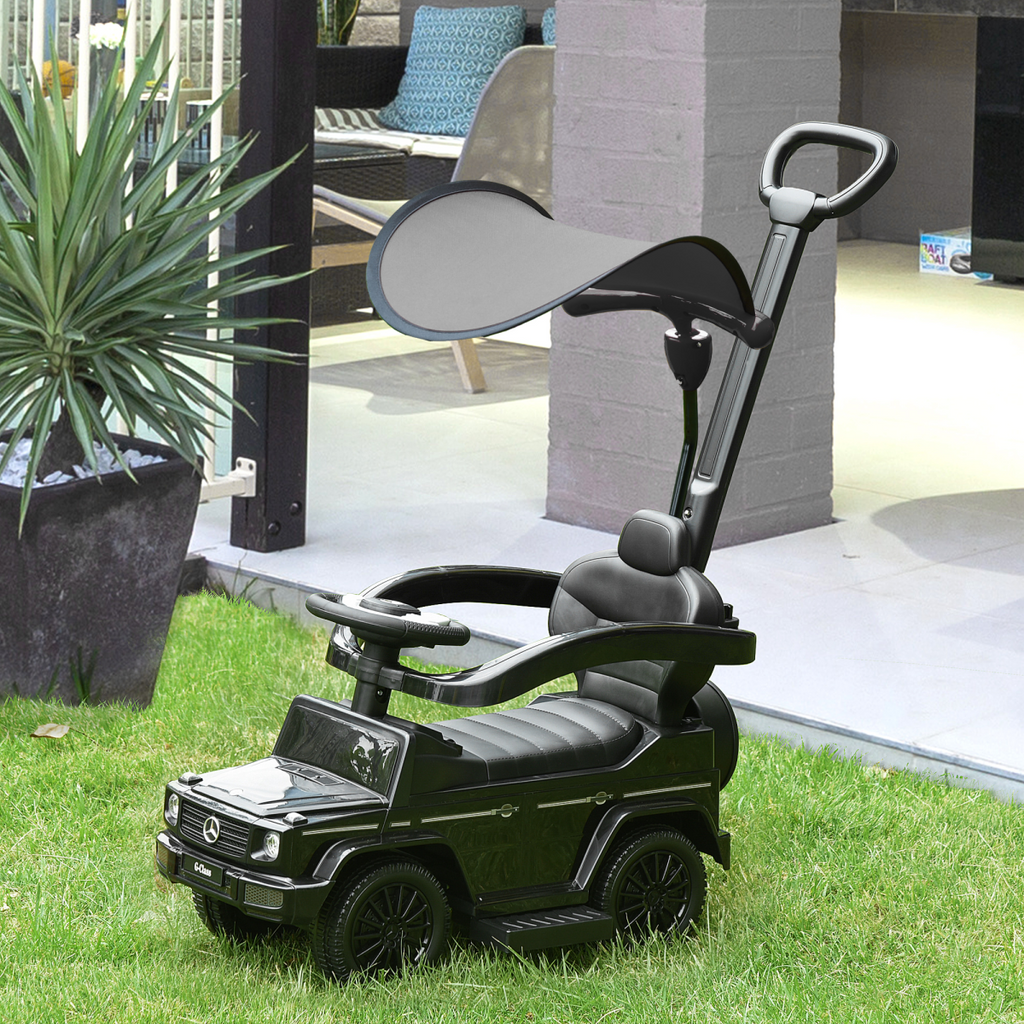 Licensed Mercedes Benz G350 ride-on push car in black with sun canopy for toddlers aged 12-36 months.
