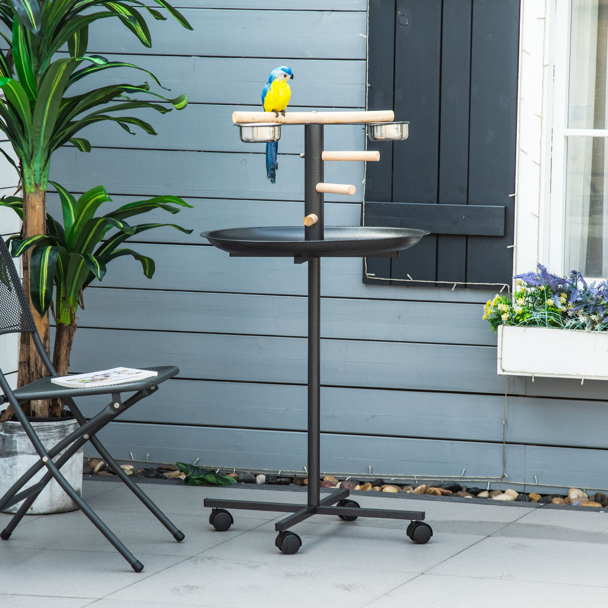 Portable bird play stand by Pawhut featuring wooden perches and feeding bowls for pet birds.