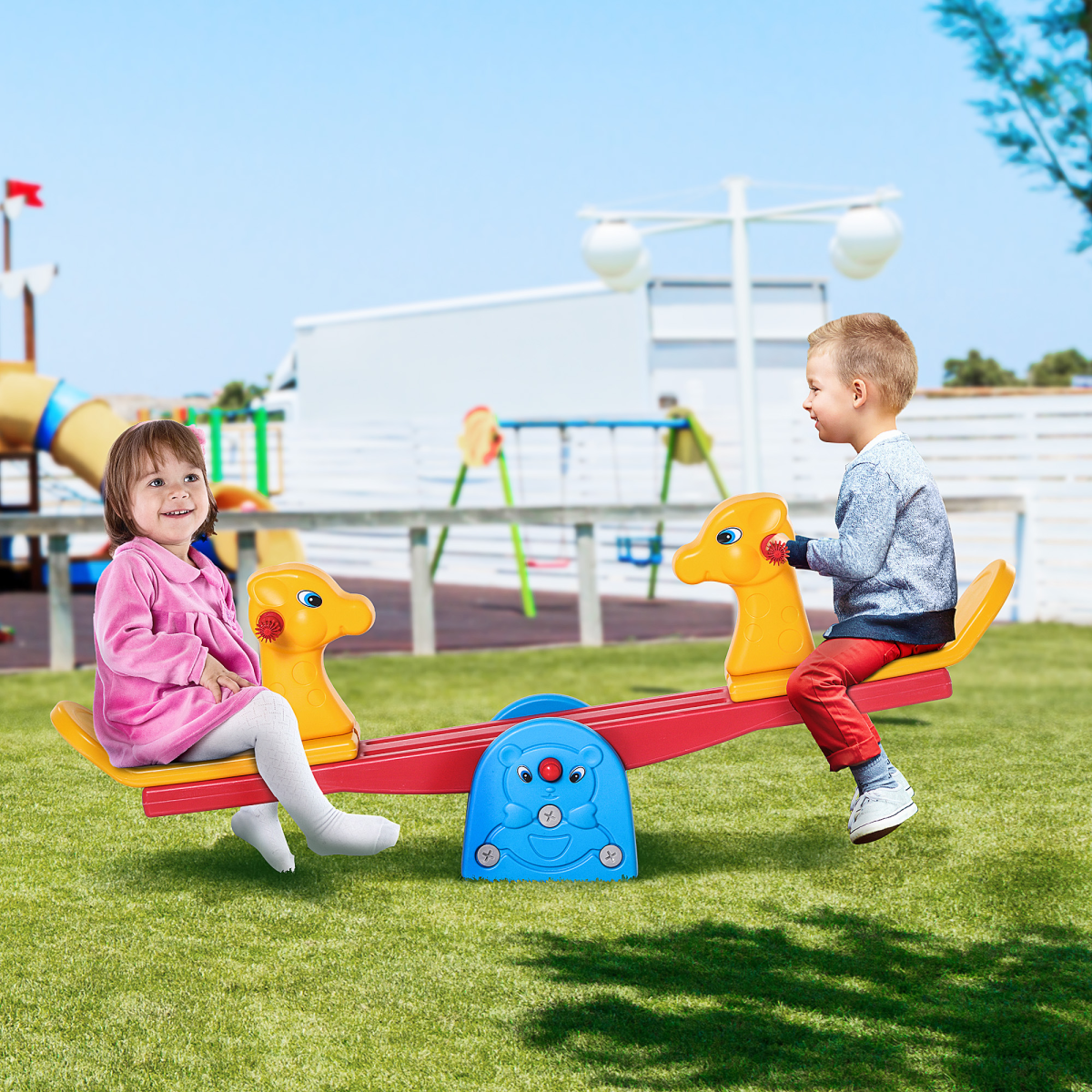 Kids seesaw teeter totter by HOMCOM with two seats and easy-grip handles for safe outdoor play.