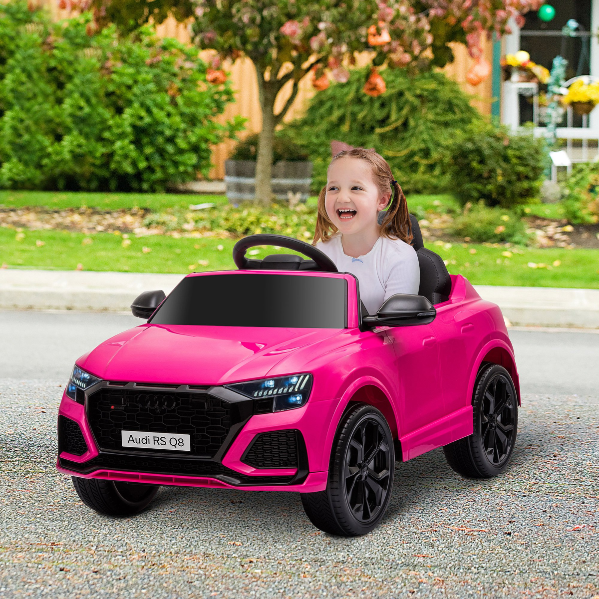 Pink Audi RS Q8 6V electric ride-on car for kids aged 3-5 with remote control, showcasing sleek design and sturdy wheels.