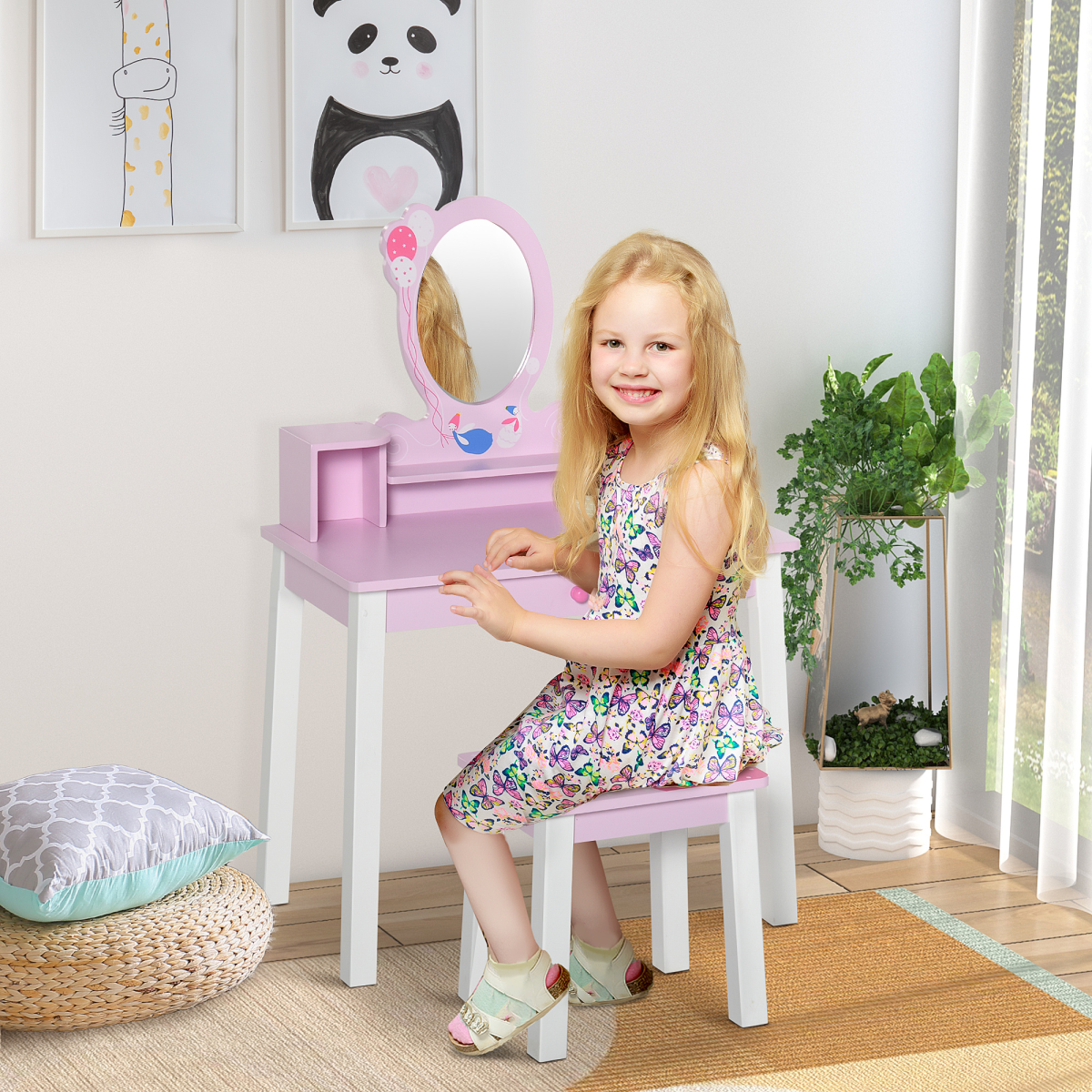 Kids pink dressing table and stool set by FunZone, featuring a mirror and storage with playful cartoon patterns.