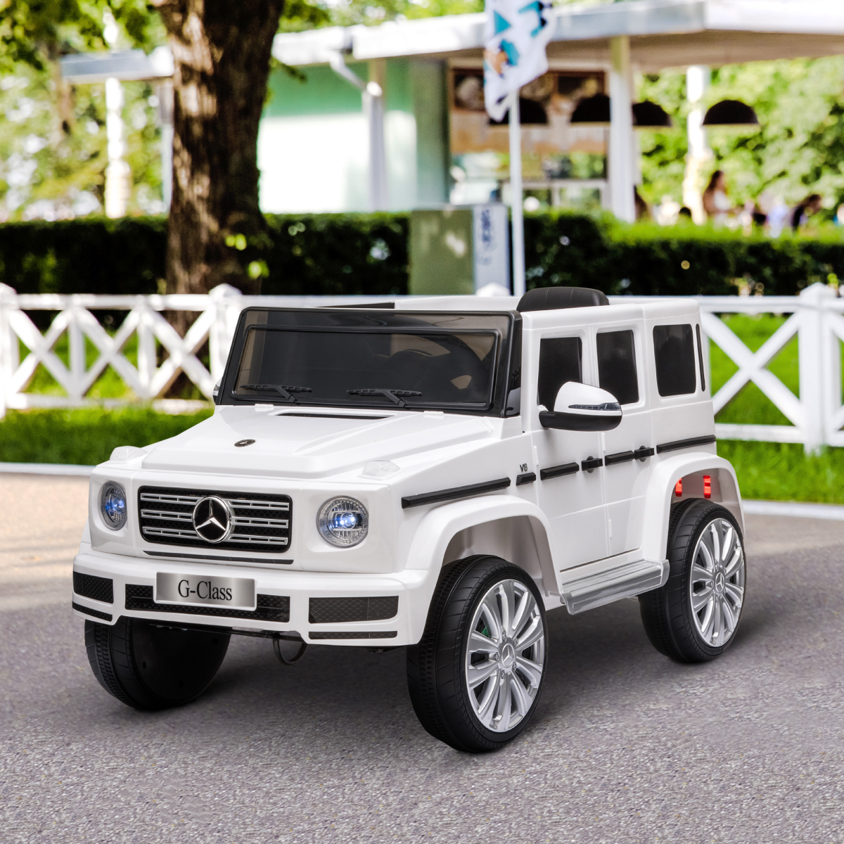 Licensed Mercedes Benz G500 electric ride-on car in white for kids ages 3-8, featuring a remote control.