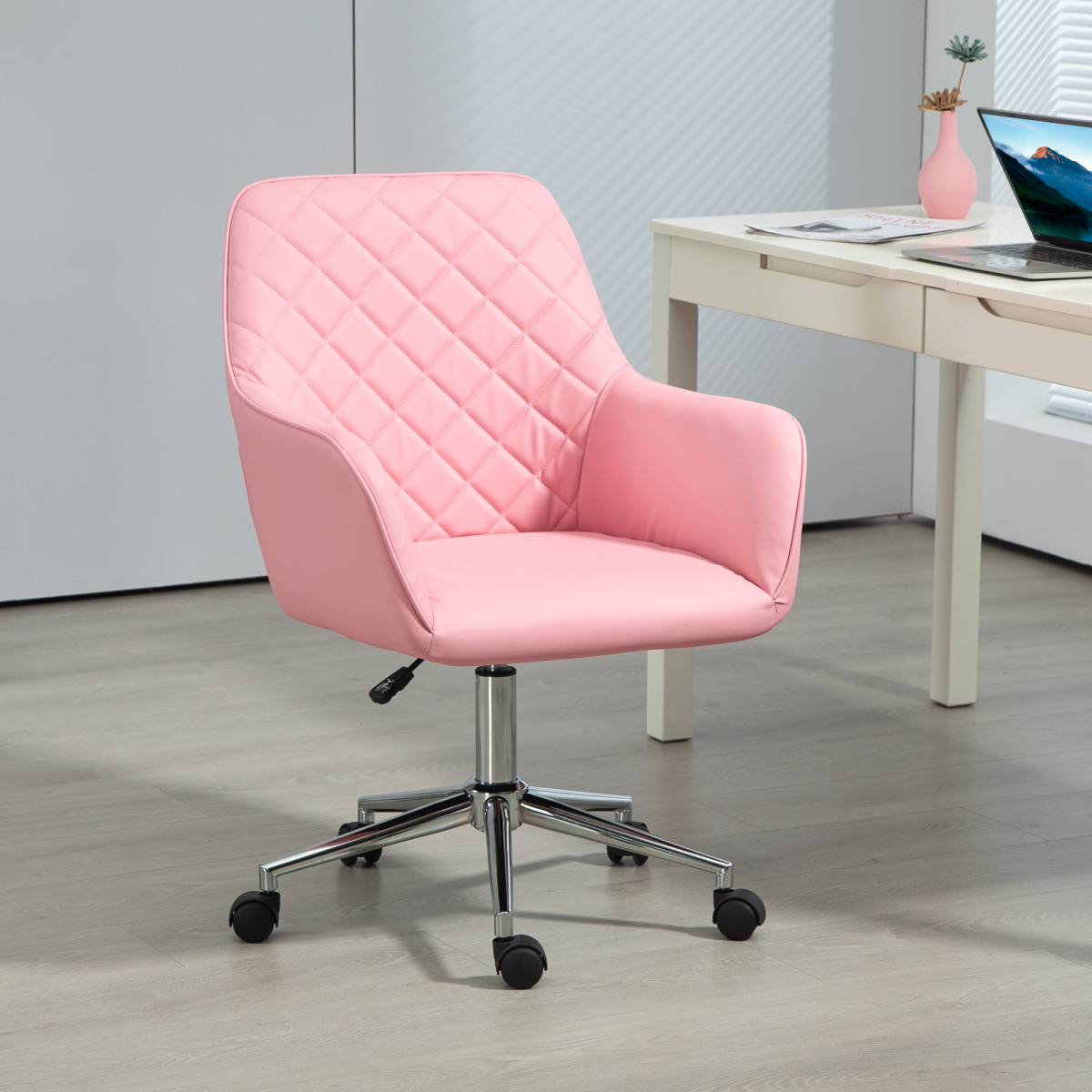 Vinsetto pink leather-feel home office chair with armrests and swivel base, perfect for a stylish workspace.