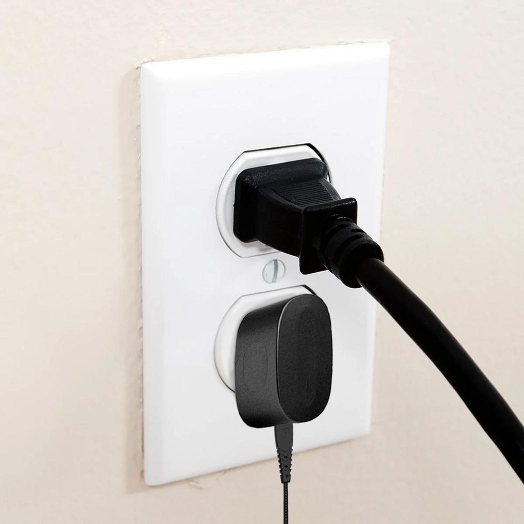 FX TechHub dual USB mains charger with EU plug in black and multicoloured design, showcasing two USB ports.