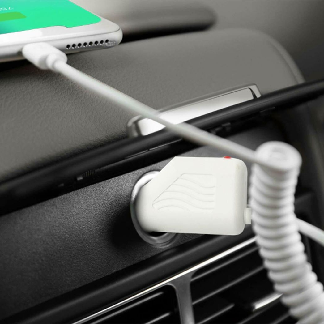 Compact FX Factory car charger for micro USB devices, 650mAh, in white with a sleek design.