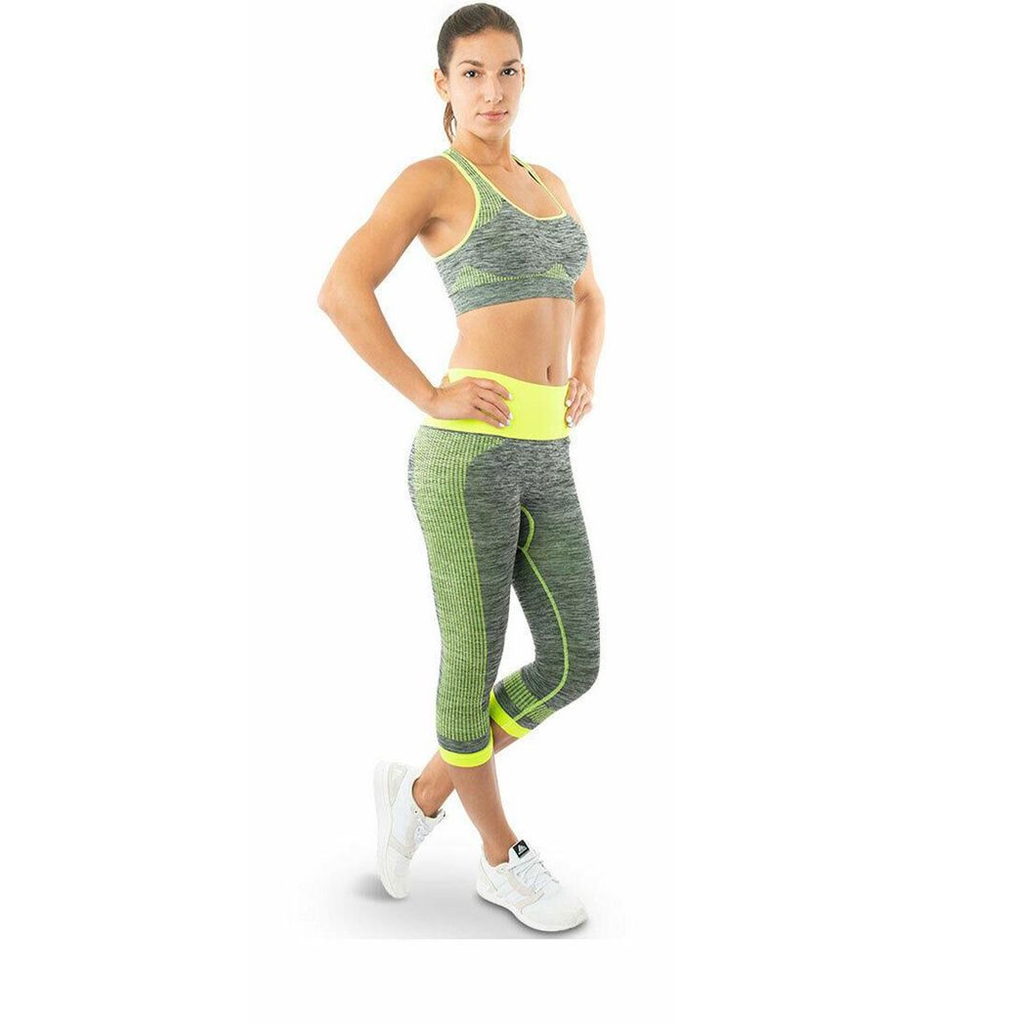 Aquarius women's green yoga sportswear set in size small, featuring a fitted top and matching leggings on a white background.