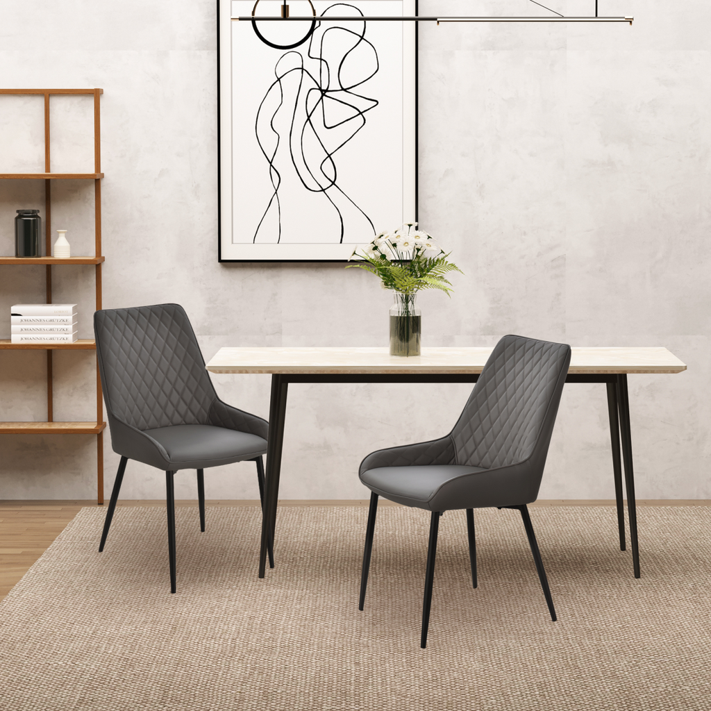 Set of 2 grey quilted PU leather dining chairs with metal frame by HOMCOM, showcasing a modern design and comfortable seating.