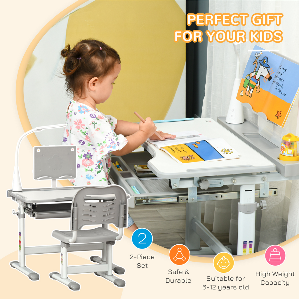 Kids study desk and chair set with adjustable height and USB lamp in grey by HOMCOM, perfect for a fun learning space.
