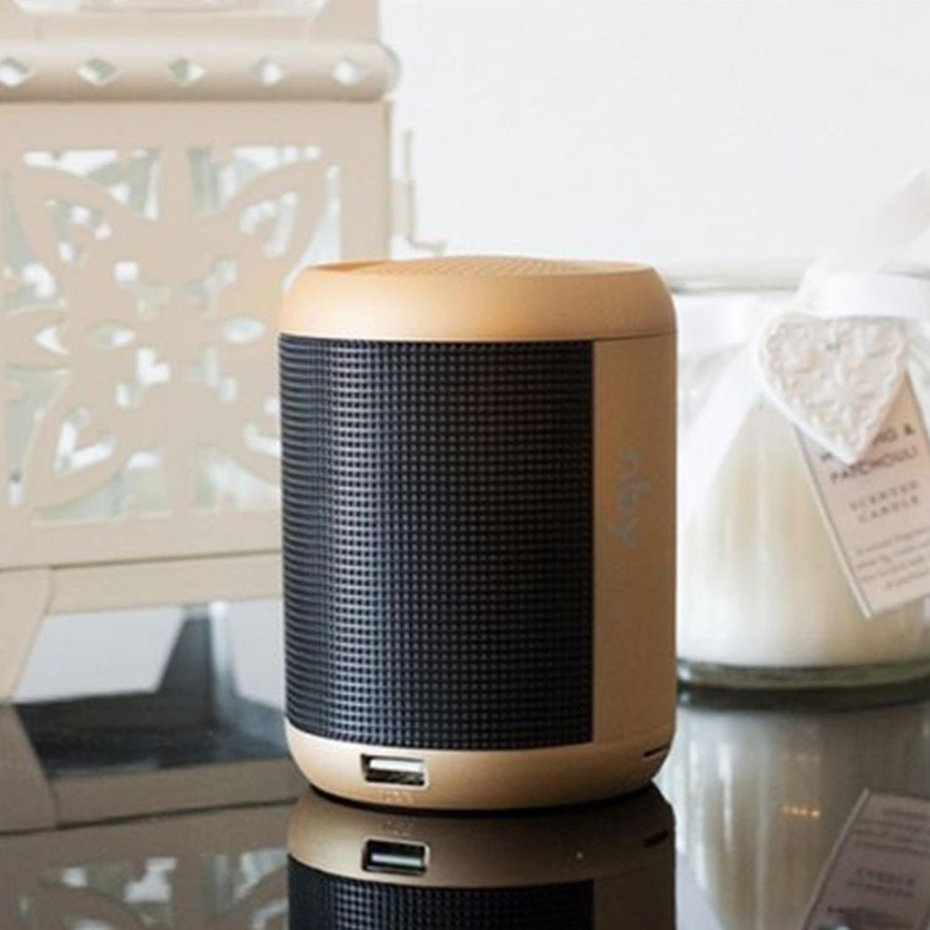 Gold NBY sound activated LED light Bluetooth speaker with a dancing fountain feature.