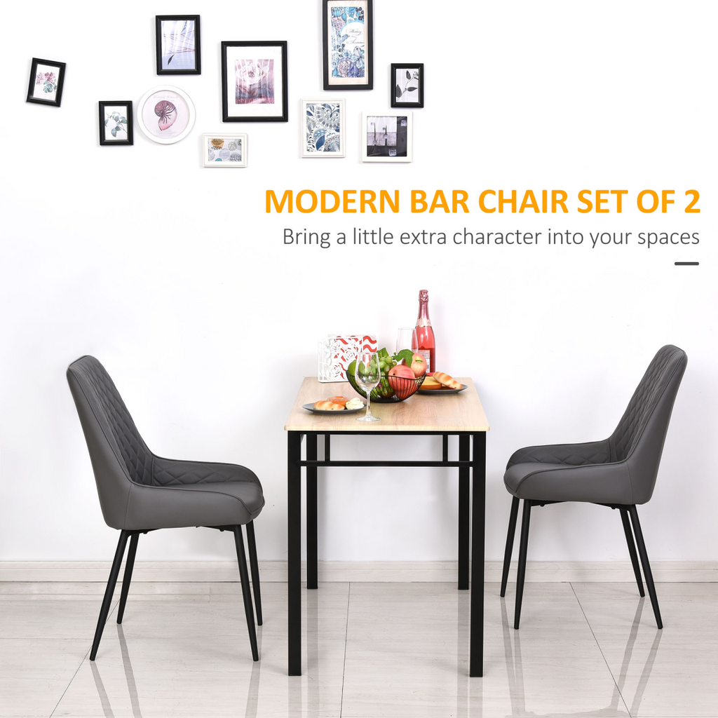 Set of 2 grey quilted PU leather dining chairs with metal frame by HOMCOM, showcasing modern design and comfort.