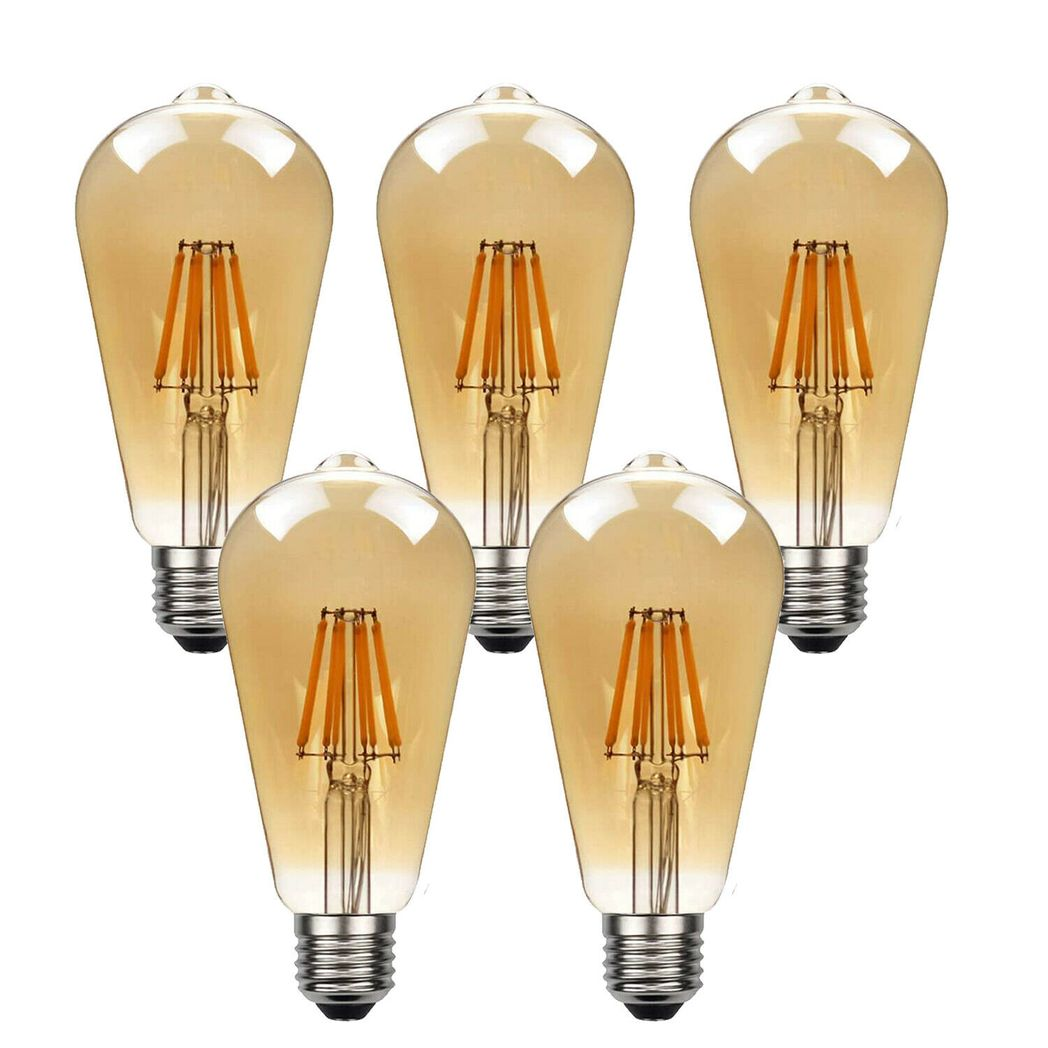 Five LED Edison bulbs in vintage amber ST64 style, E27 dimmable, by Ledsone, glowing softly at 2700K.