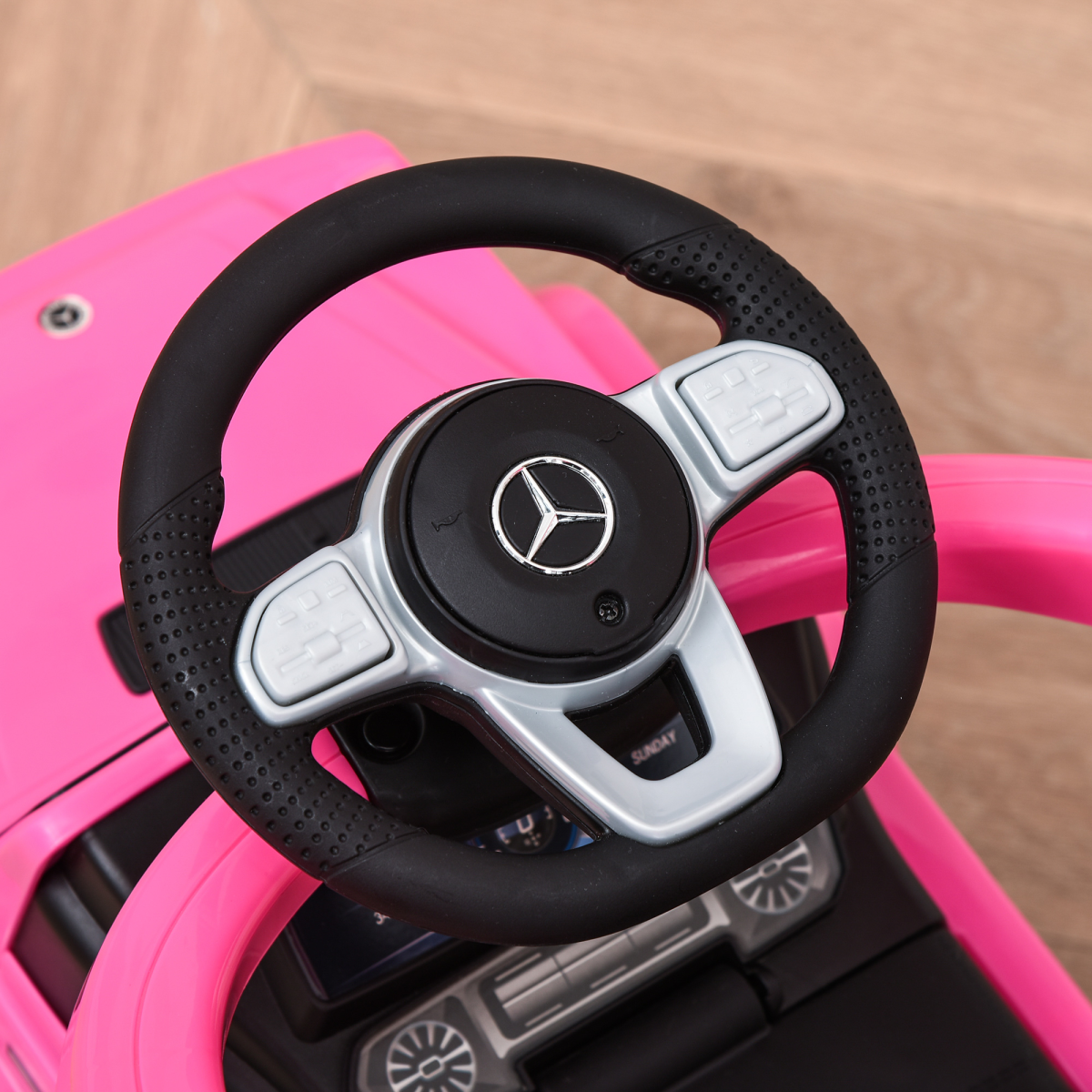 Licensed pink Mercedes Benz G350 ride-on push car with sun canopy for toddlers aged 12-36 months by FunZone.