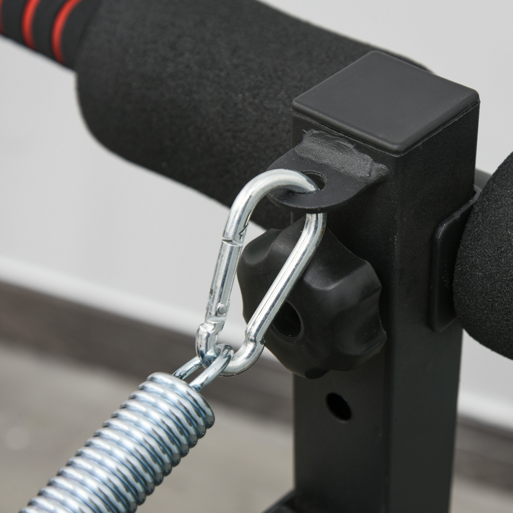 Foldable black sit-up bench for core workouts, designed for home gyms, showcasing ActiveGear ergonomic features.