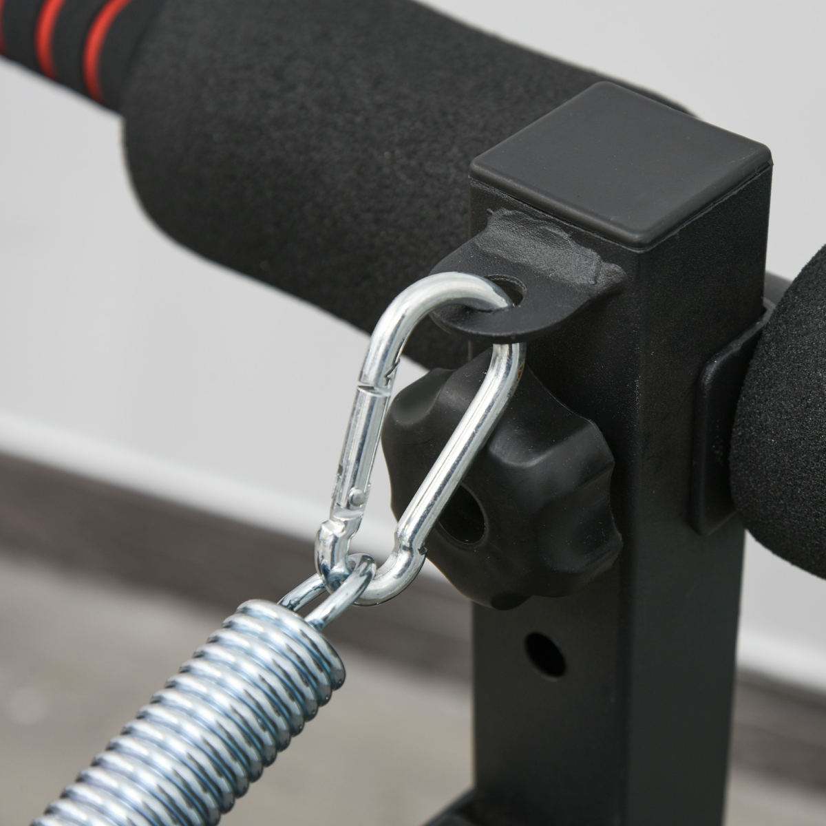 Foldable black sit-up bench for core workouts, designed for home gyms, showcasing ActiveGear ergonomic features.