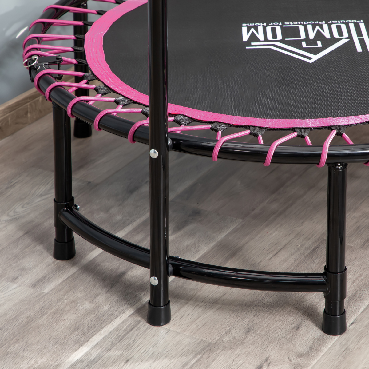 40" Mini trampoline in pink with adjustable handle, suitable for indoor and outdoor fitness activities.