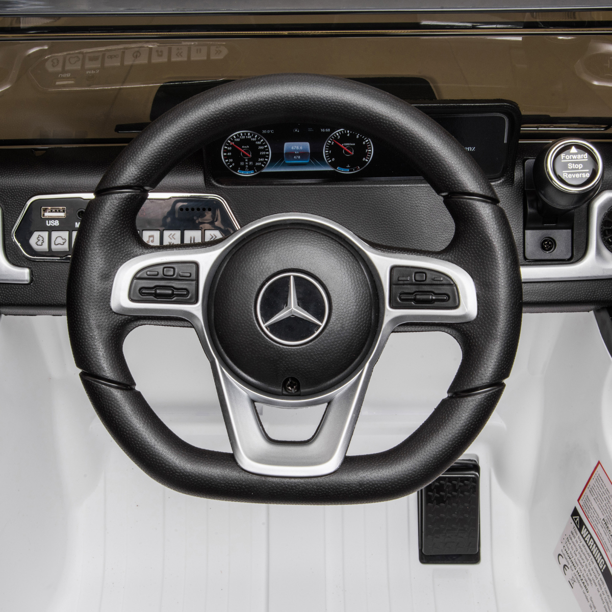 White Mercedes Benz G500 12V electric ride-on car for kids ages 3-8, featuring remote control and realistic design.