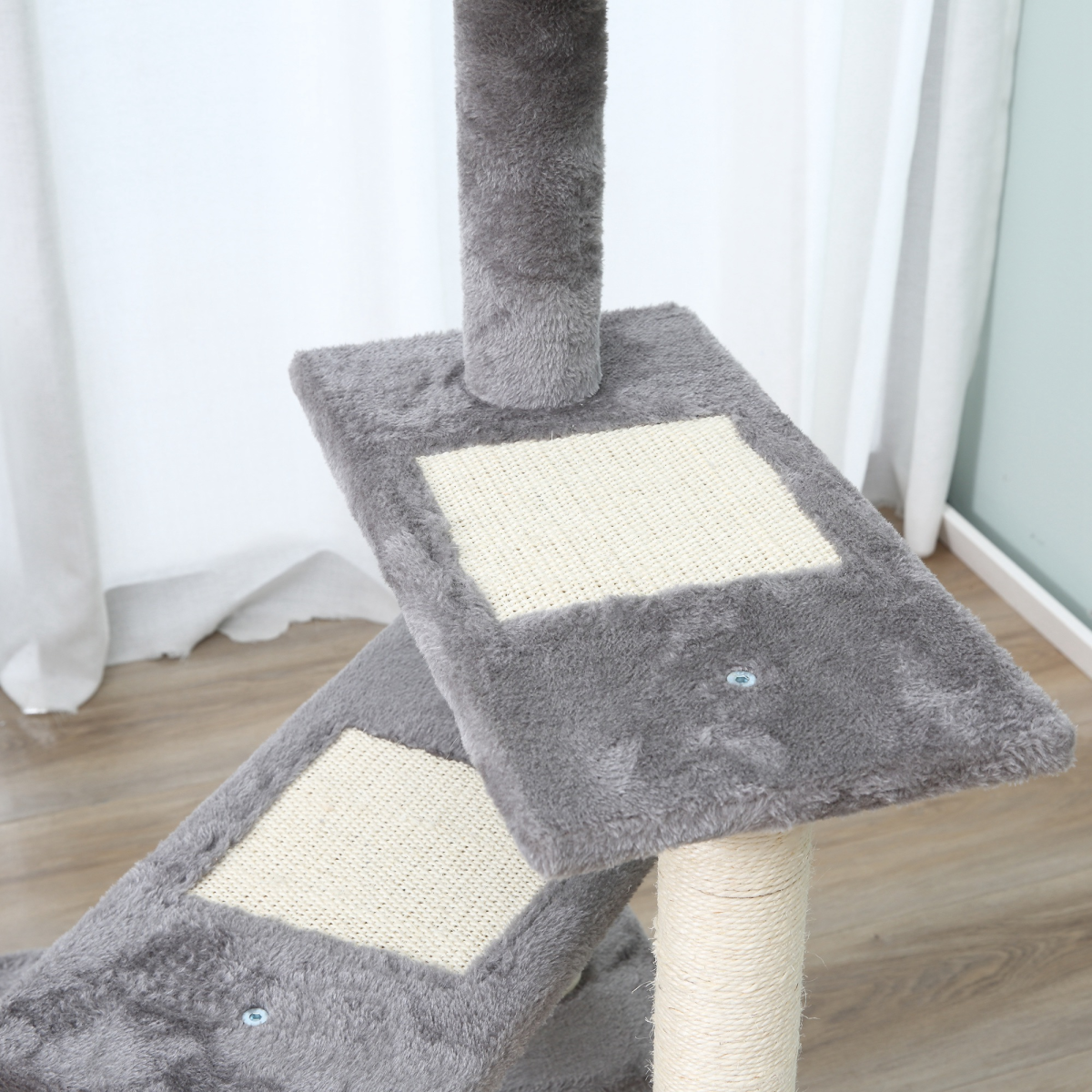 Plush Cat Tree Activity Center with climbing tower and scratching post for kittens, designed for playful feline fun.