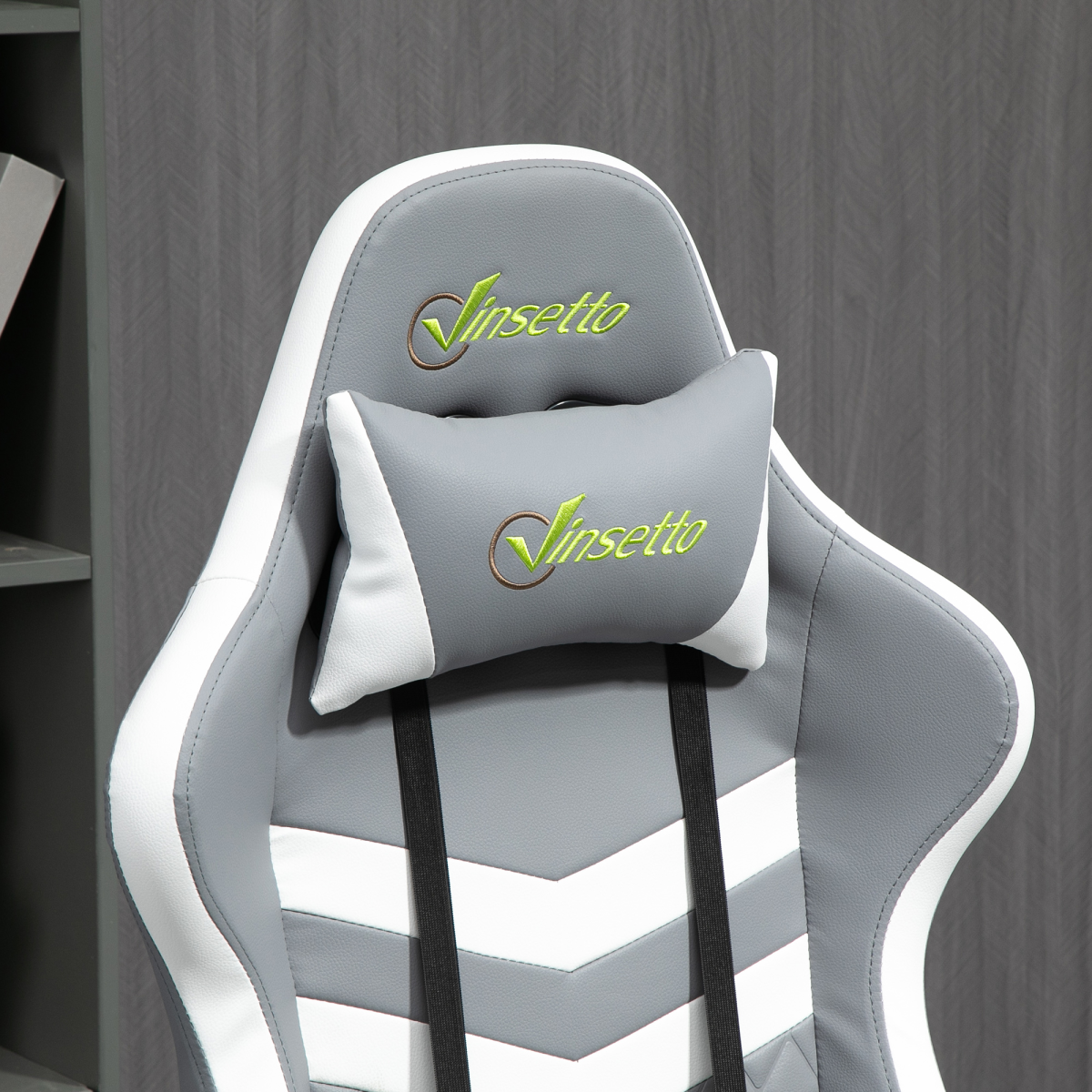 Grey and white Racing Gaming Chair with lumbar support and headrest, designed for comfort during long gaming sessions.