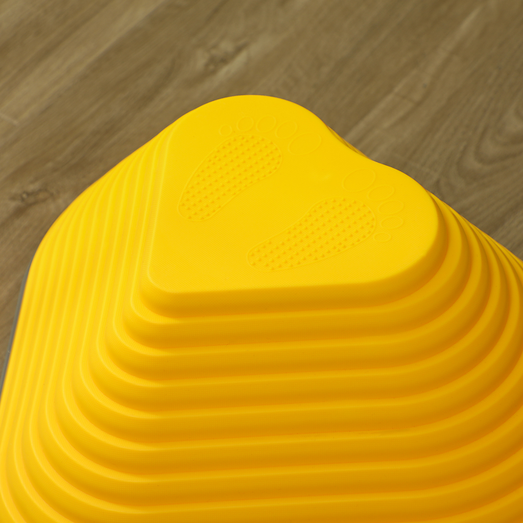 Colorful AIYAPLAY non-slip kids stepping stones stacked outdoors, designed for playful activities and safe play.