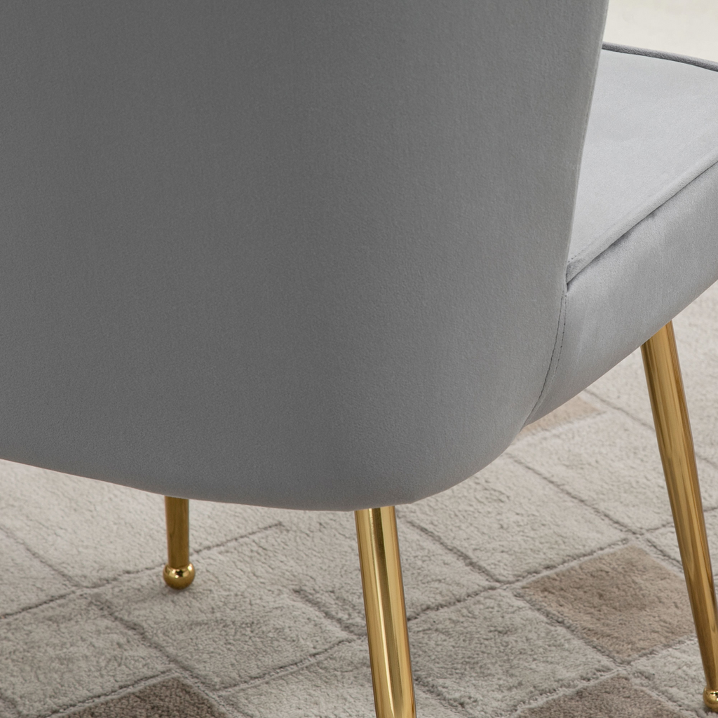 Grey velvet-feel shell accent chair with metal legs by Homcom, ideal for home bedroom lounge settings.