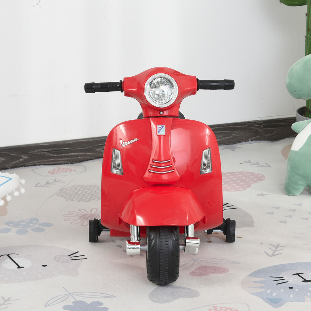 Vespa licensed kids ride-on motorcycle in red, 6V battery powered, featuring realistic design and safe riding features.