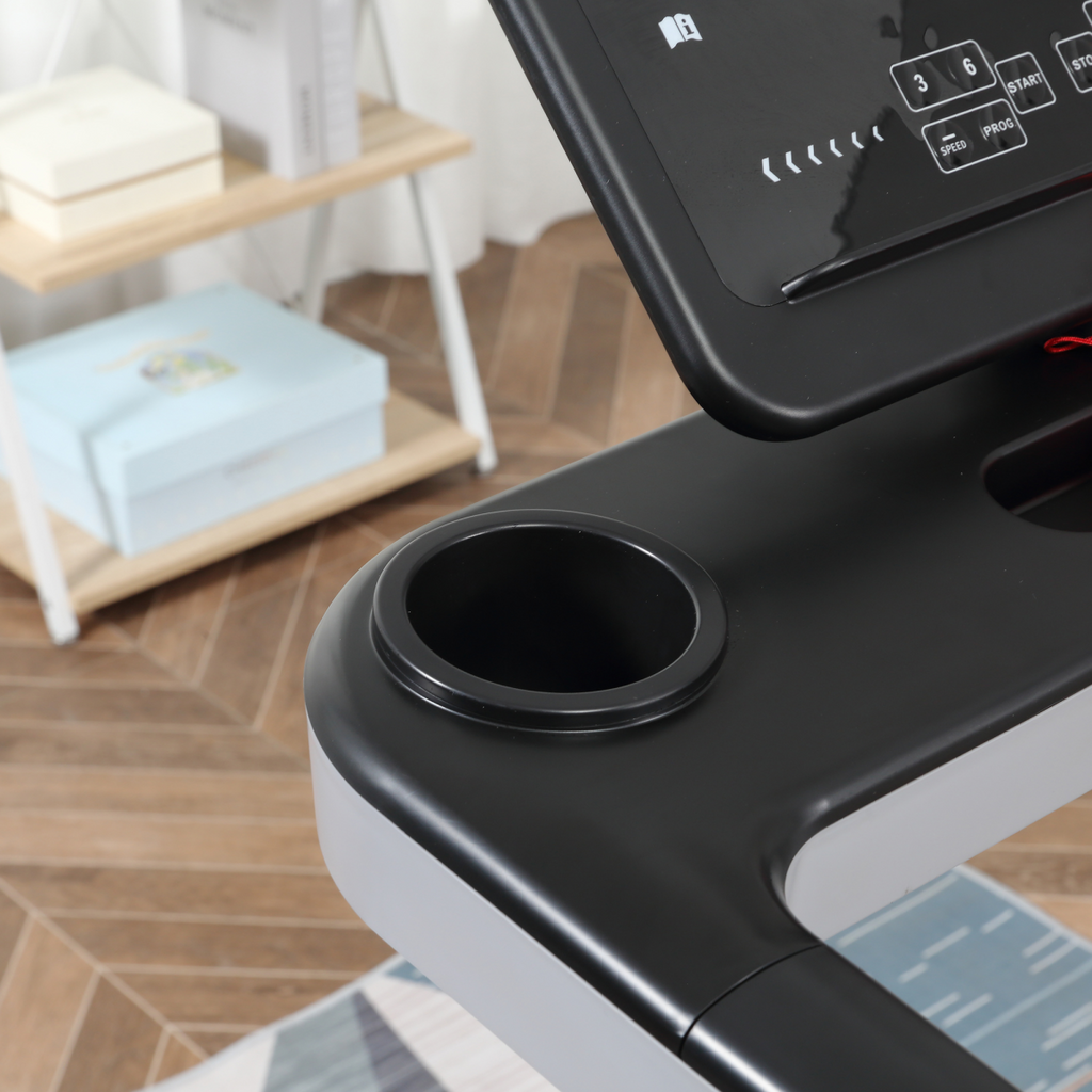 ActiveGear motorised treadmill with folding frame, wheels, and preset programs, showcasing the control panel and running surface.