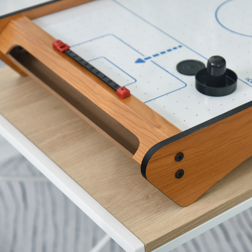 Mini Air Hockey Tabletop Game with fan motor, scoreboard, and battery operation, suitable for ages 8 and up.