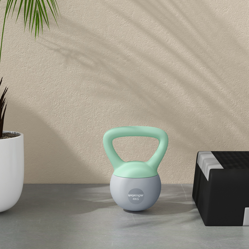 Grey and green 4KG kettlebell with soft body and non-slip handle from SPORTNOW, ideal for strength training.