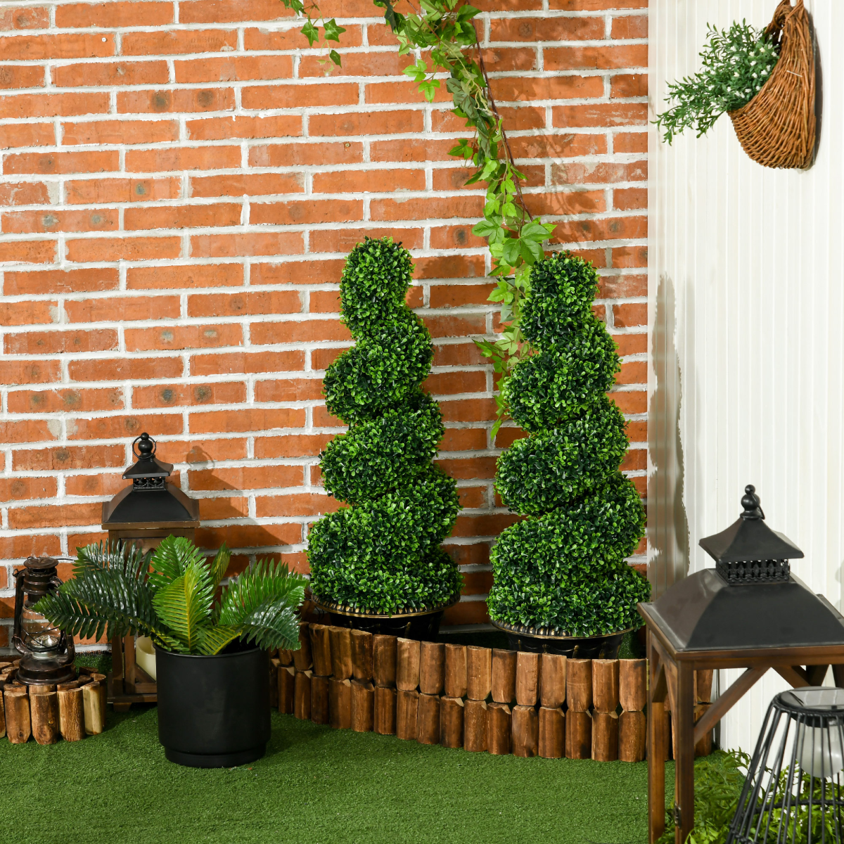 Set of 2 HOMCOM artificial topiary spiral trees, 90cm tall, featuring boxwood leaves and lavender accents.