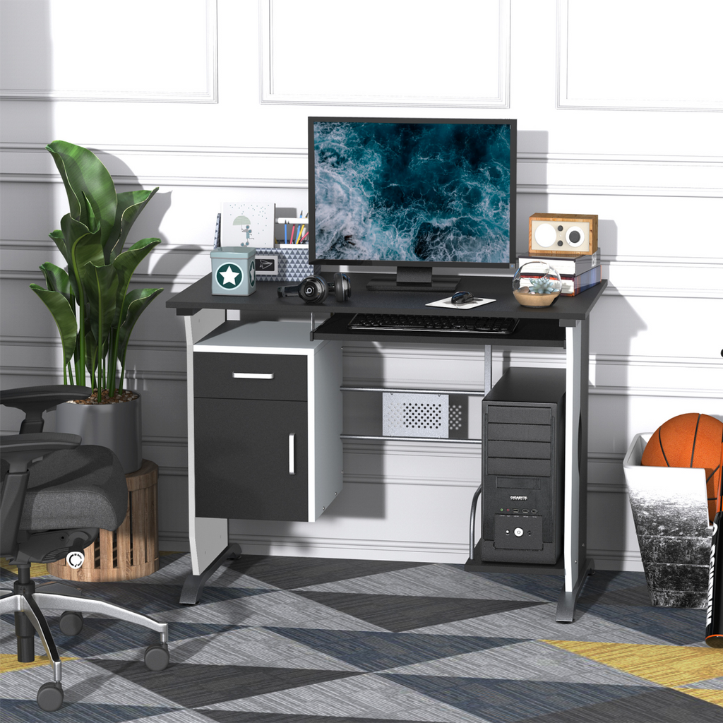 Black wooden workstation computer desk featuring a keyboard shelf and drawers by HomeCraft.
