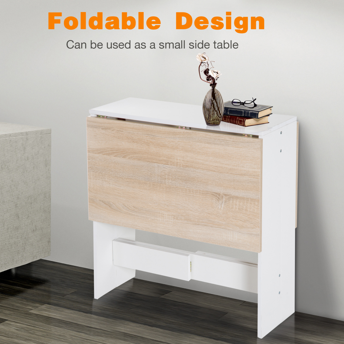 HOMCOM oak white drop leaf folding table, seats 6, showcasing a space-saving, multifunctional design in a cozy setting.