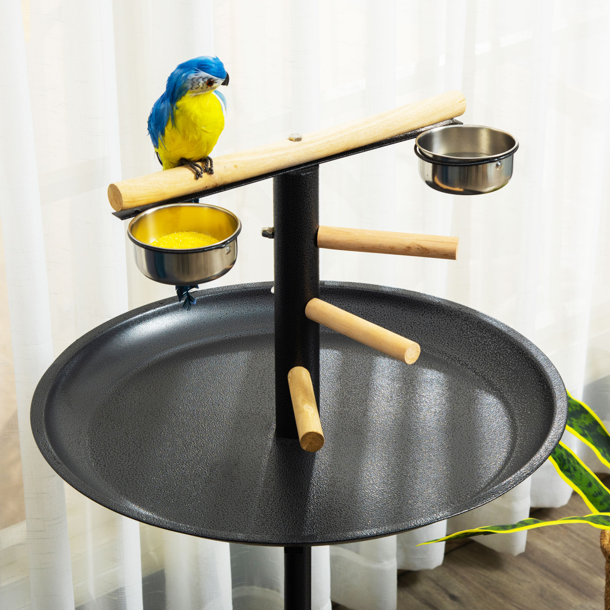 Portable bird play stand by Pawhut with wooden perches and feeding bowls for pet birds.