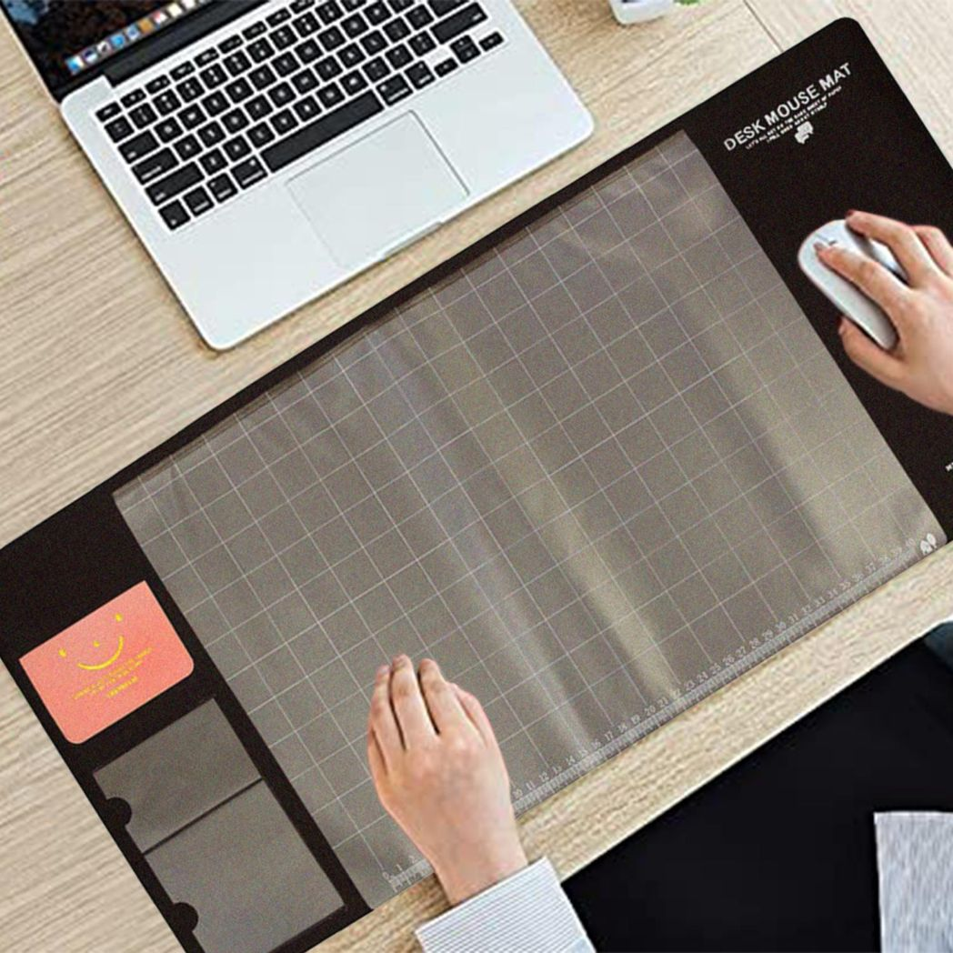 Brown multifunctional eco-friendly office desk mouse mat by Aquarius, made of PVC and DS material, shown on a desk.