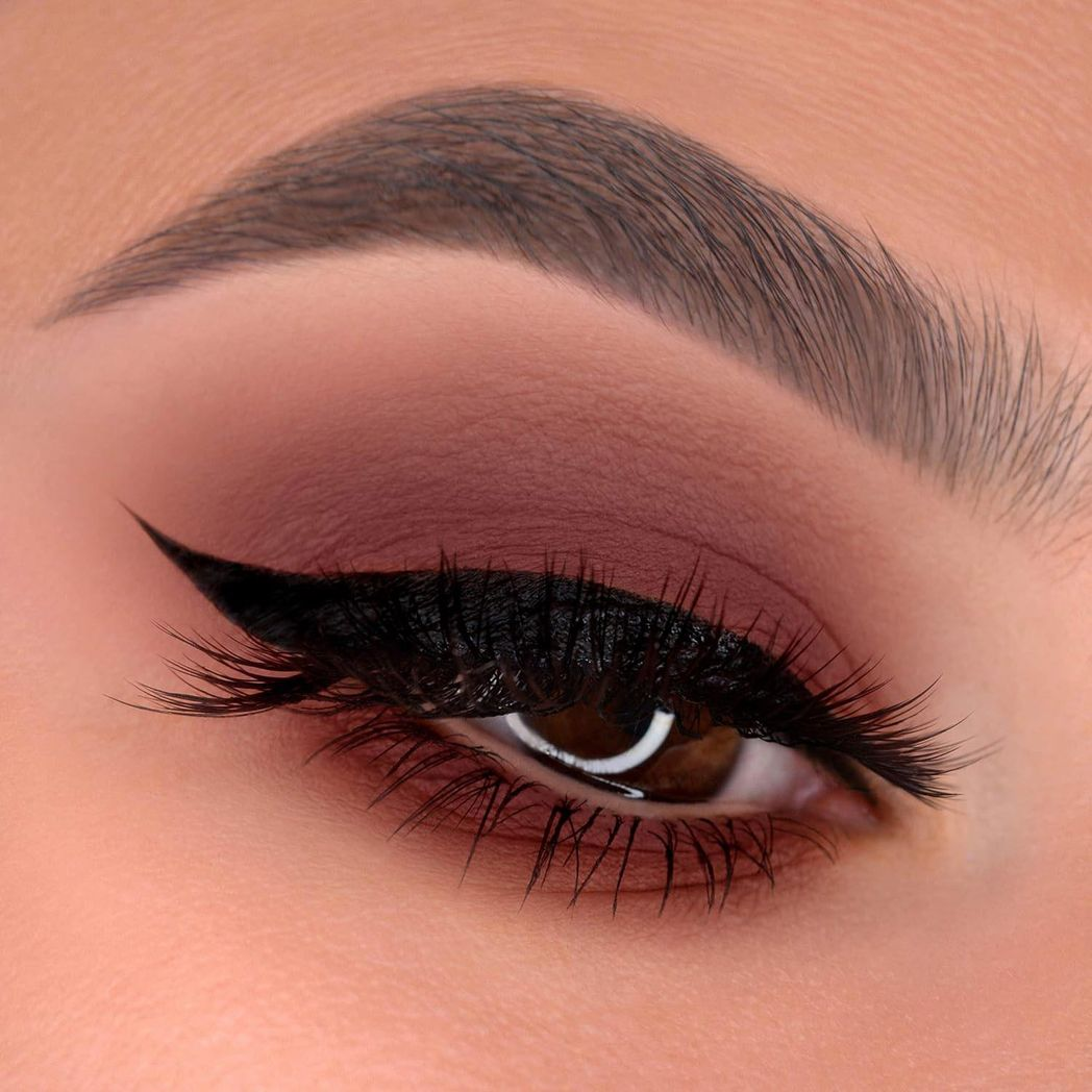 Dark mauve pressed matte face pigment drop from Glitz toy beautytech in a sleek dropper bottle.
