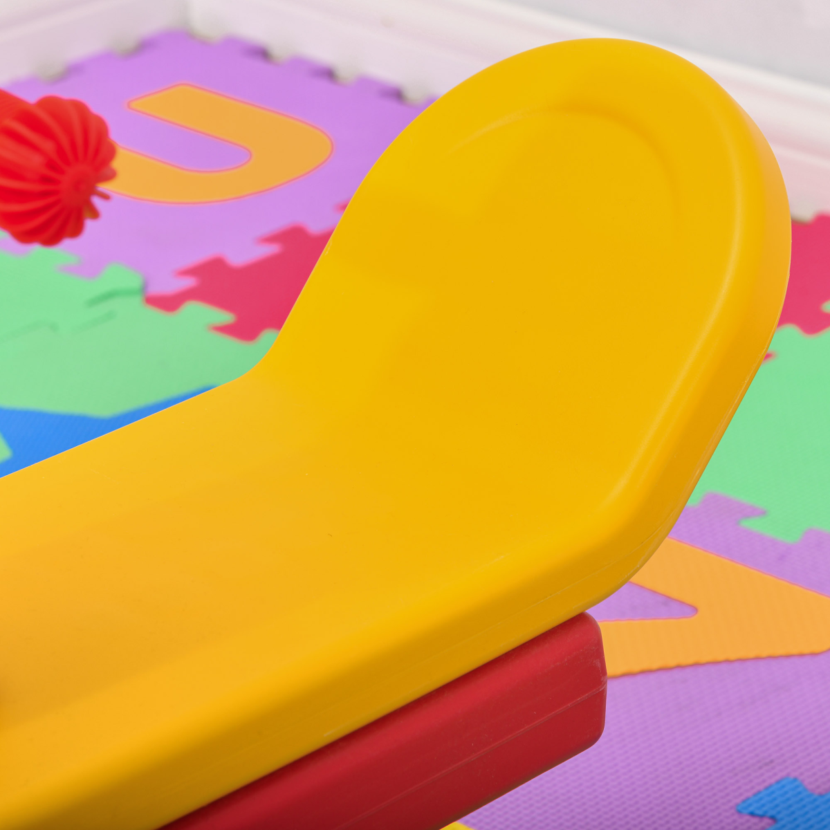 Kids seesaw by HOMCOM with two seats and easy-grip handles, designed for safe outdoor play and fun.