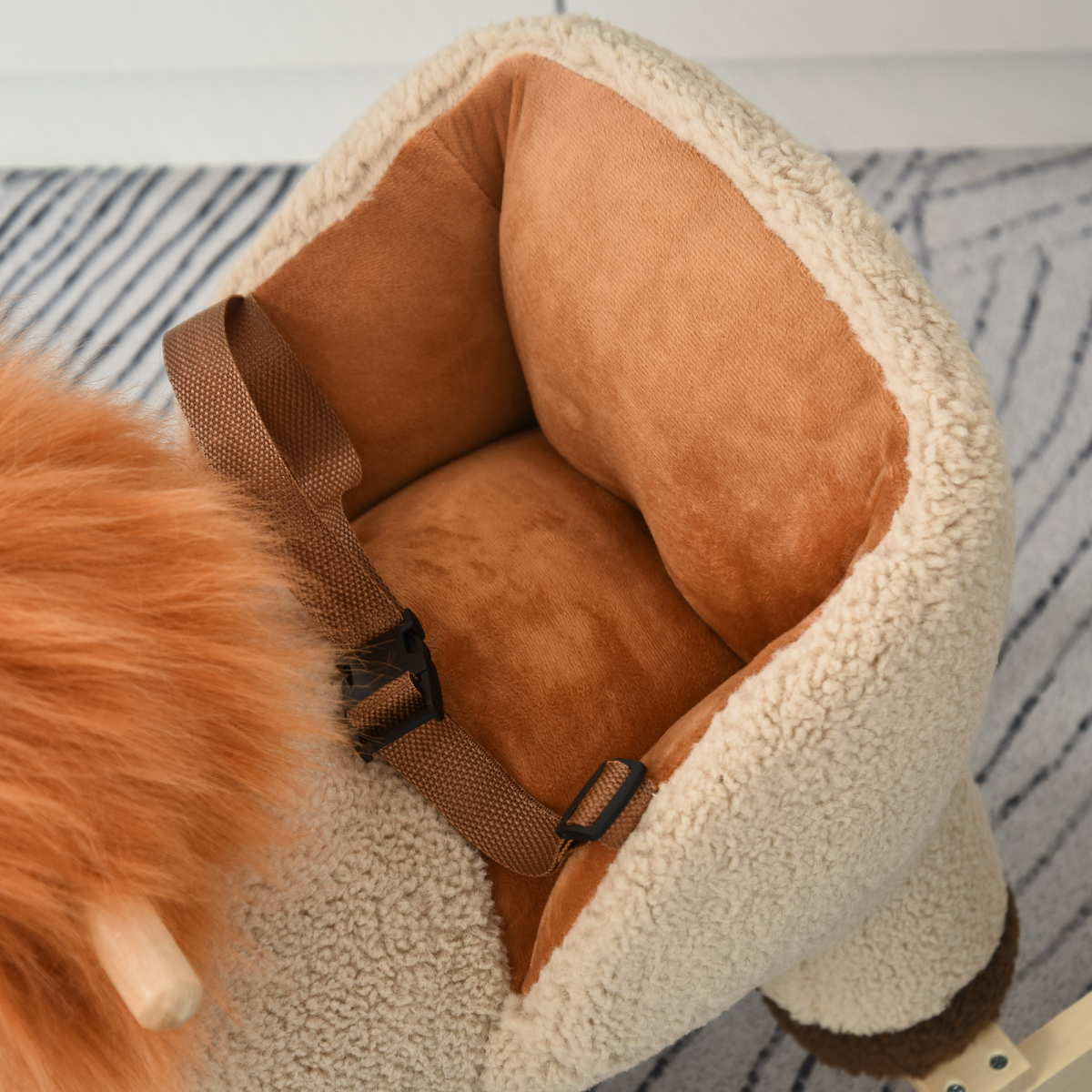 Kids rocking lion plush ride-on toy with sound button and seat belt, perfect for ages 18-36 months. FunZone brand.