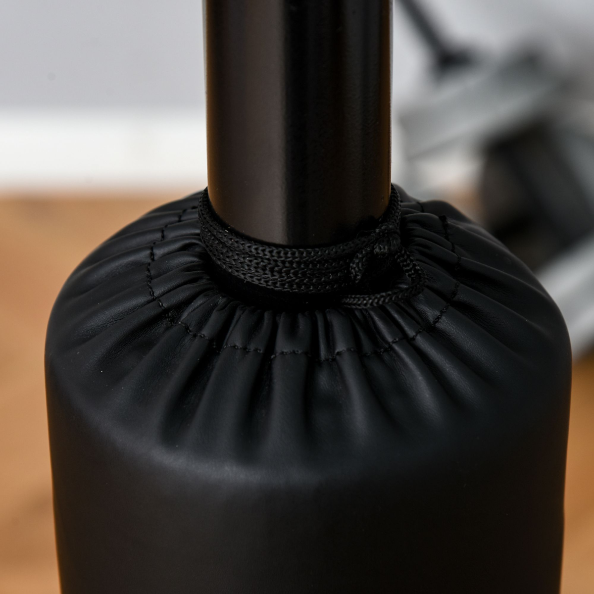 3-in-1 punching bag with stand, featuring two speedballs and a 360° reflex bar for versatile training.